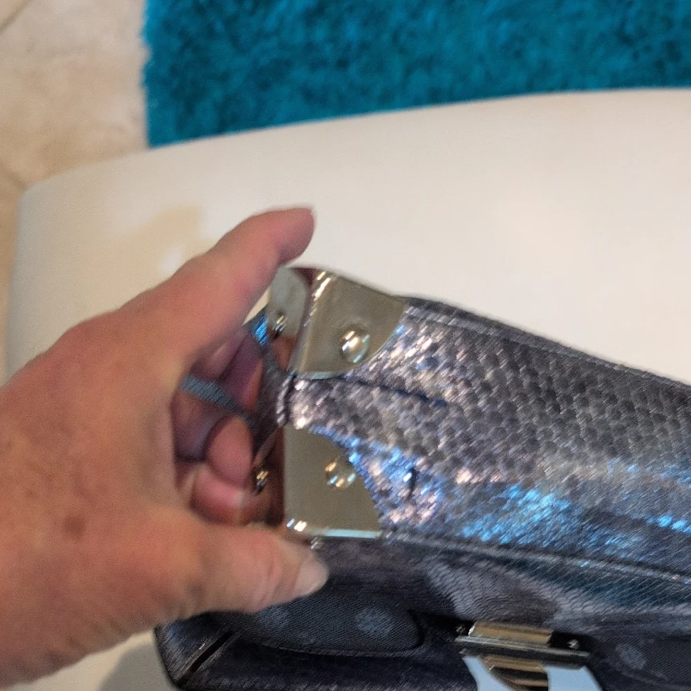 Miss Me Shimmering Silver Clutch